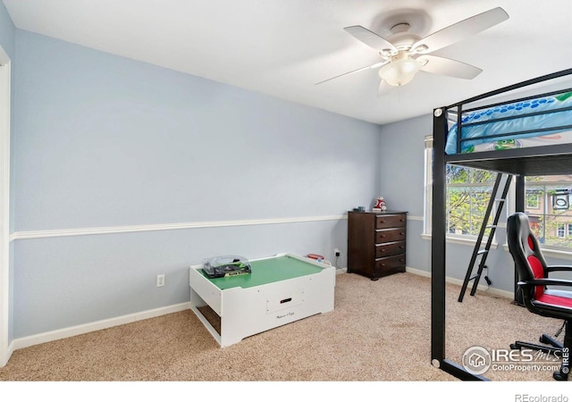 bedroom with baseboards, carpet flooring, and ceiling fan