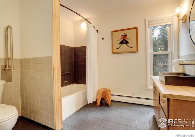 4 Porphyry Vw, Jamestown, CO 80455 - bathroom with a baseboard radiator, toilet, tile patterned flooring, vanity, and shower / tub combo