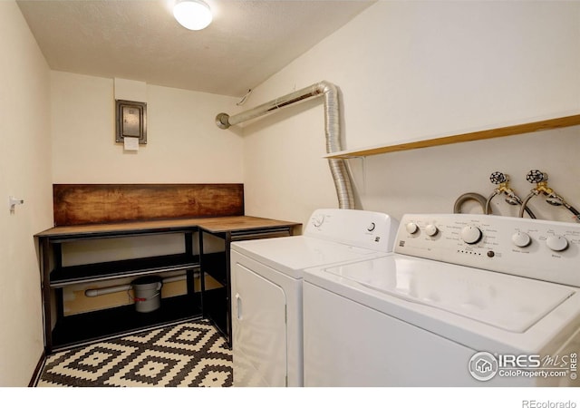 4 Porphyry Vw, Jamestown, CO 80455 - laundry room featuring washing machine and dryer and a textured ceiling