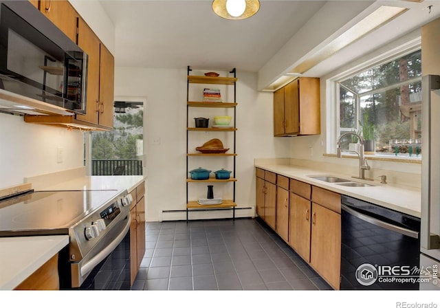 4 Porphyry Vw, Jamestown, CO 80455 - kitchen with dishwashing machine, electric stove, black microwave, a baseboard radiator, and a sink