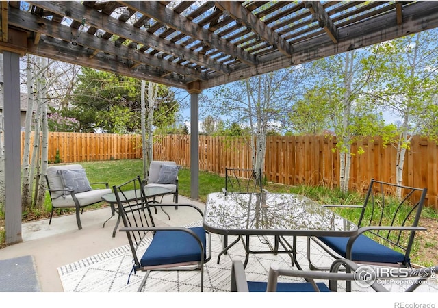 view of patio / terrace featuring outdoor dining area, a fenced backyard, and a pergola
