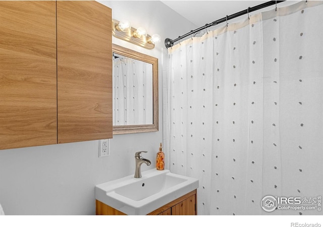 full bathroom with vanity
