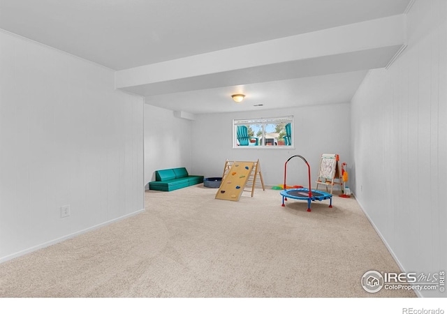 game room with carpet floors and baseboards