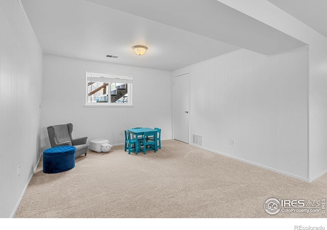 unfurnished room with carpet flooring, baseboards, and visible vents
