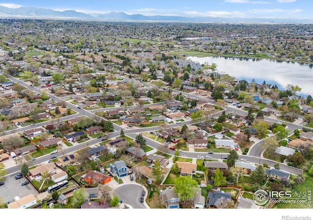 aerial view with a residential view and a water and mountain view