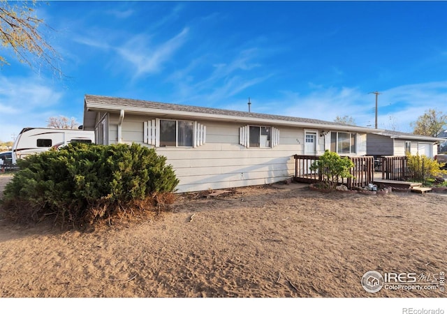 single story home with a deck