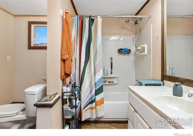 bathroom featuring toilet, shower / tub combo with curtain, and vanity