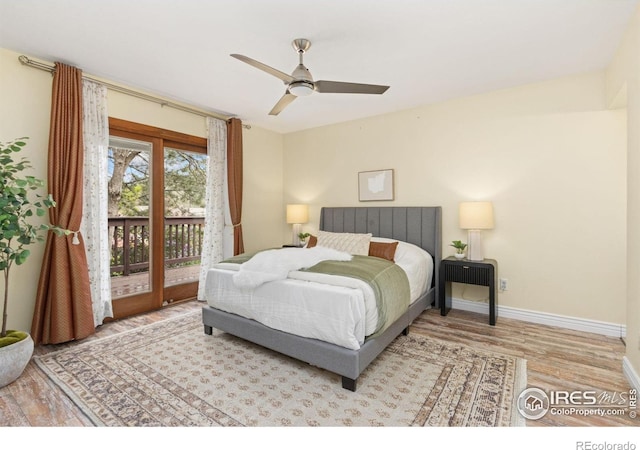 bedroom with baseboards, ceiling fan, wood finished floors, and access to exterior
