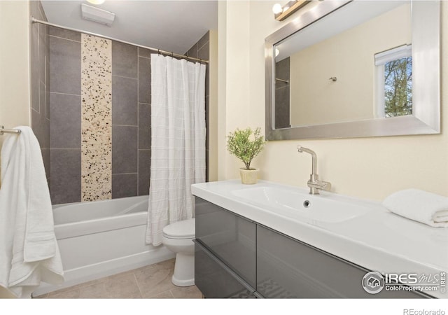 2617 Treemont Dr, Fort Collins, CO 80524 - bathroom featuring toilet, vanity, shower / tub combo, and tile patterned flooring