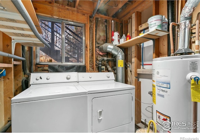 713 Boltz Dr, Fort Collins, CO 80525 - clothes washing area featuring independent washer and dryer and gas water heater