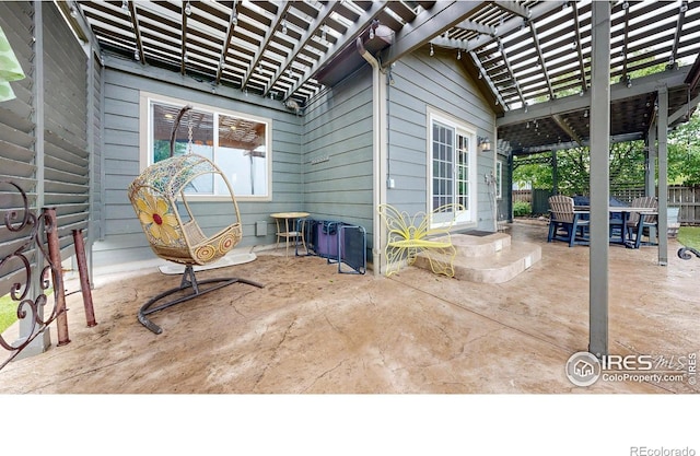 1442 Mallard Dr, Johnstown, CO 80534 - view of patio / terrace featuring a pergola and fence