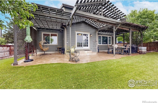 1442 Mallard Dr, Johnstown, CO 80534 - rear view of house with a pergola and a patio area