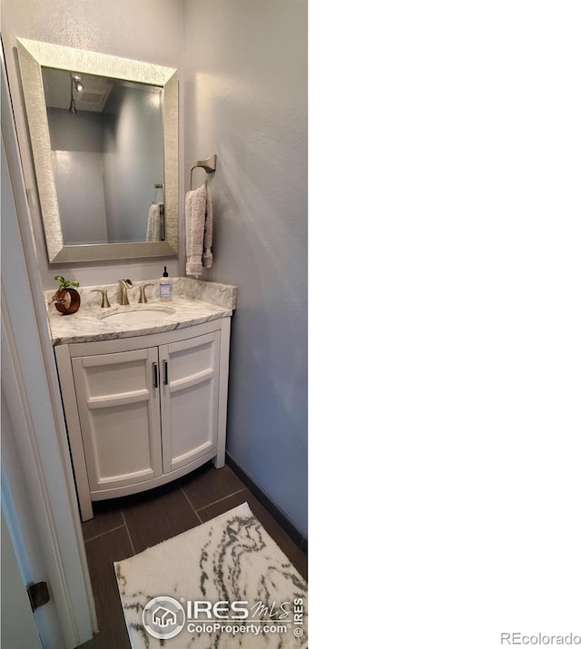1180 Monroe Dr Unit C, Boulder, CO 80303 - bathroom featuring vanity and wood tiled floors