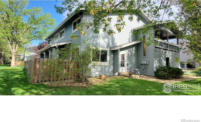 1180 Monroe Dr Unit C, Boulder, CO 80303 - back of property featuring central AC and a balcony