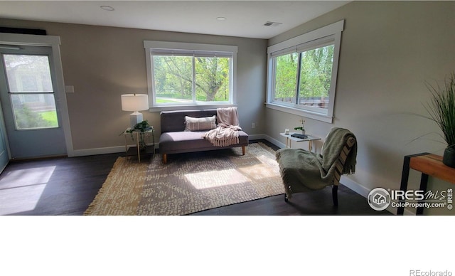 1180 Monroe Dr Unit C, Boulder, CO 80303 - sitting room featuring wood finished floors and baseboards