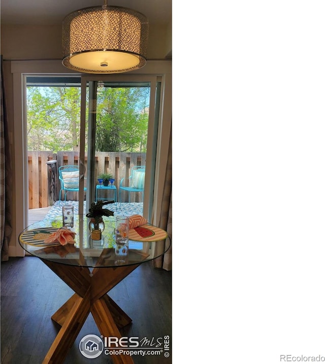 1180 Monroe Dr Unit C, Boulder, CO 80303 - dining space featuring wood finished floors and plenty of natural light