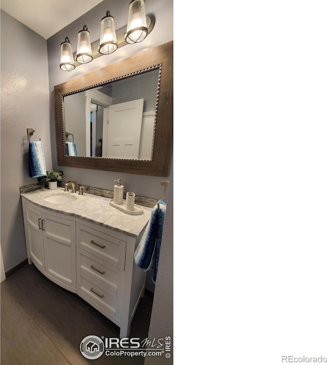 1180 Monroe Dr Unit C, Boulder, CO 80303 - bathroom with vanity and wood finished floors
