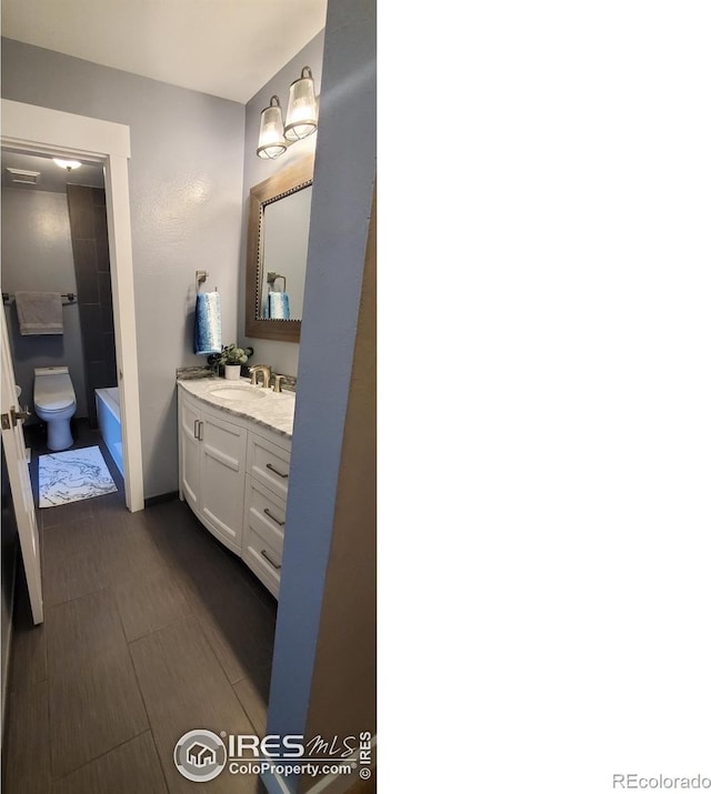 1180 Monroe Dr Unit C, Boulder, CO 80303 - bathroom with vanity and toilet