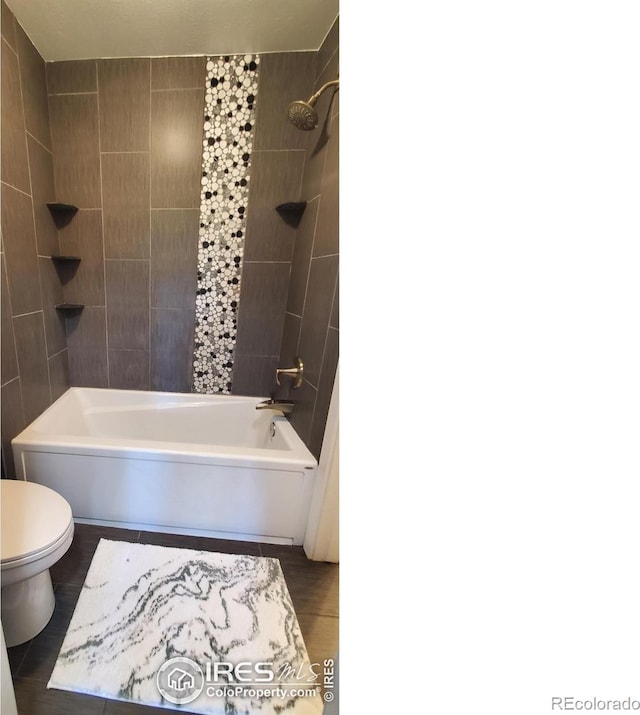 1180 Monroe Dr Unit C, Boulder, CO 80303 - bathroom featuring toilet and shower / bath combination