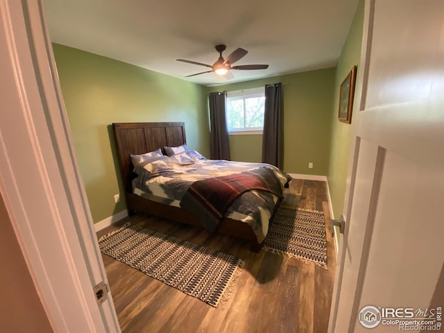1180 Monroe Dr Unit C, Boulder, CO 80303 - bedroom featuring wood finished floors, baseboards, and ceiling fan