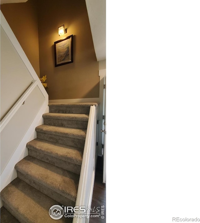 1180 Monroe Dr Unit C, Boulder, CO 80303 - stairway featuring wood finished floors