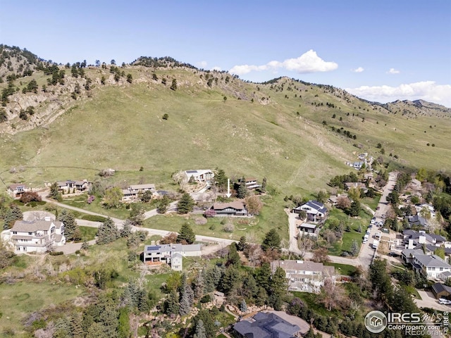 birds eye view of property featuring a residential view and a mountain view