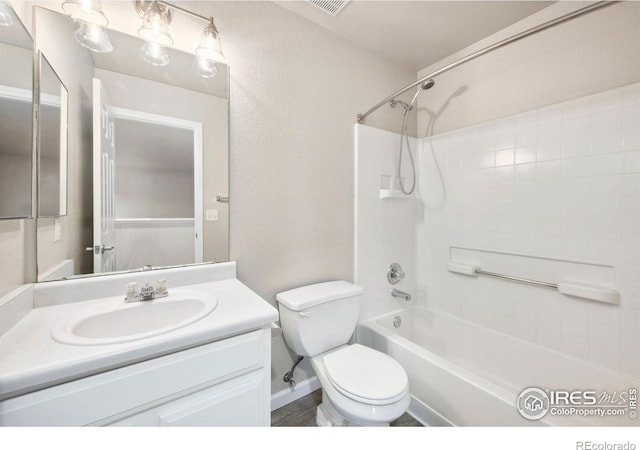 bathroom with toilet, shower / washtub combination, visible vents, and vanity