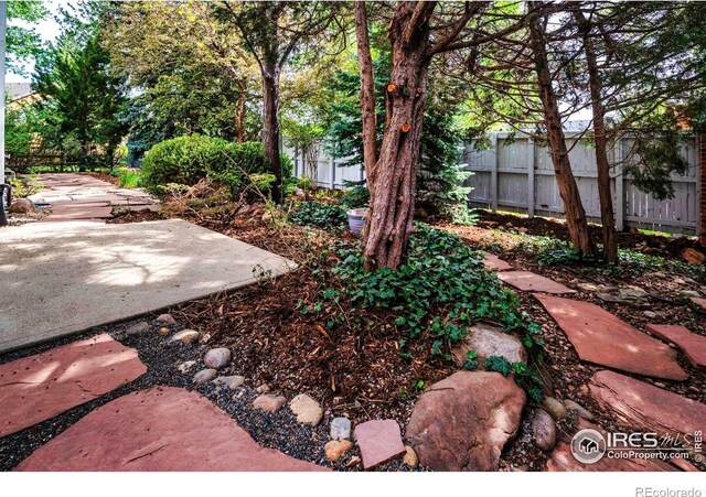 2672 Winding Trail Dr, Boulder, CO 80304 - view of yard featuring fence and a patio