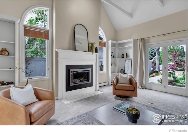 2672 Winding Trail Dr, Boulder, CO 80304 - carpeted living room with healthy amount of natural light, a fireplace with flush hearth, lofted ceiling, and a baseboard heating unit
