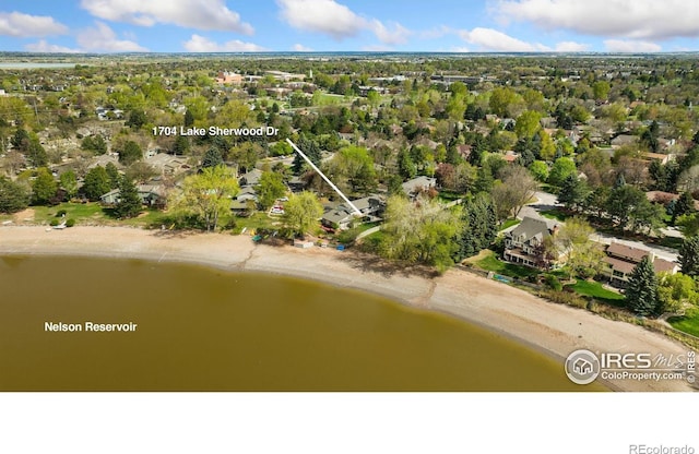 aerial view with a residential view and a water view