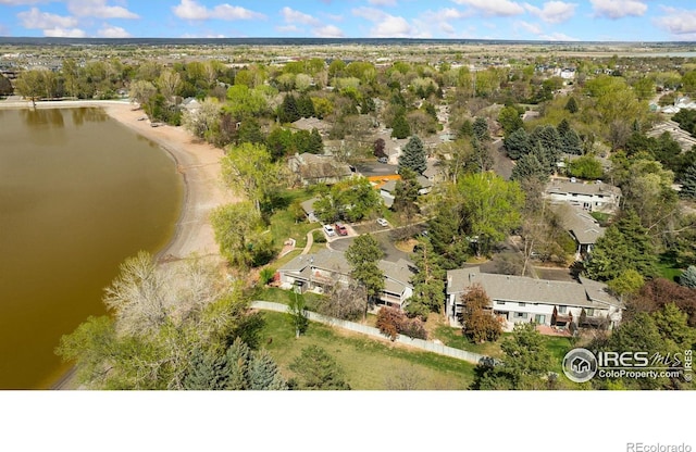 aerial view featuring a water view and a residential view