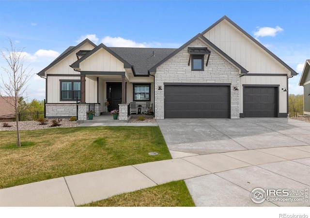 1603 Plank Ln, Fort Collins, CO 80524 - modern inspired farmhouse with covered porch, board and batten siding, driveway, fence, and a front lawn