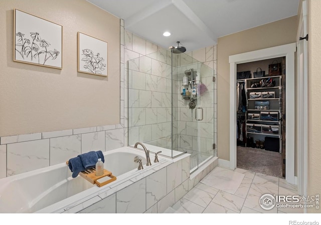 1603 Plank Ln, Fort Collins, CO 80524 - bathroom with marble finish floor, recessed lighting, a shower stall, a spacious closet, and a garden tub