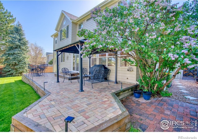 8574 W 94th Ave, Westminster, CO 80021 - view of patio / terrace with fence and outdoor lounge area