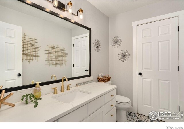 4400 Red Fox Ct, Loveland, CO 80537 - bathroom with vanity and toilet