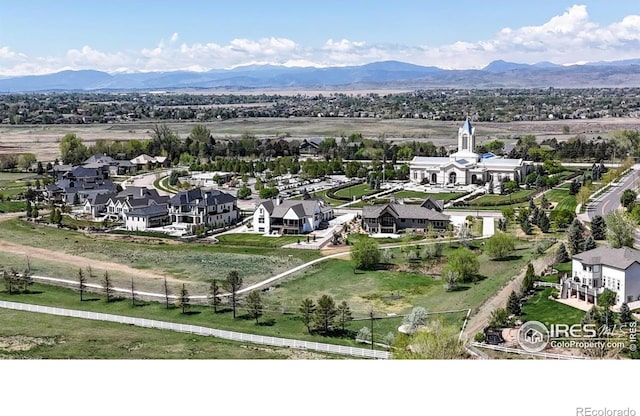 aerial perspective of suburban area with a mountain backdrop