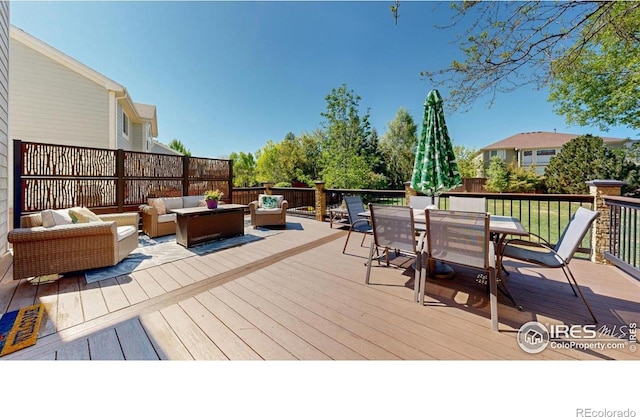 wooden deck with an outdoor hangout area and outdoor dining area