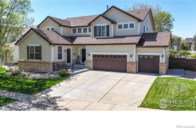 view of front of home with driveway, brick siding, an attached garage, and a shingled roof