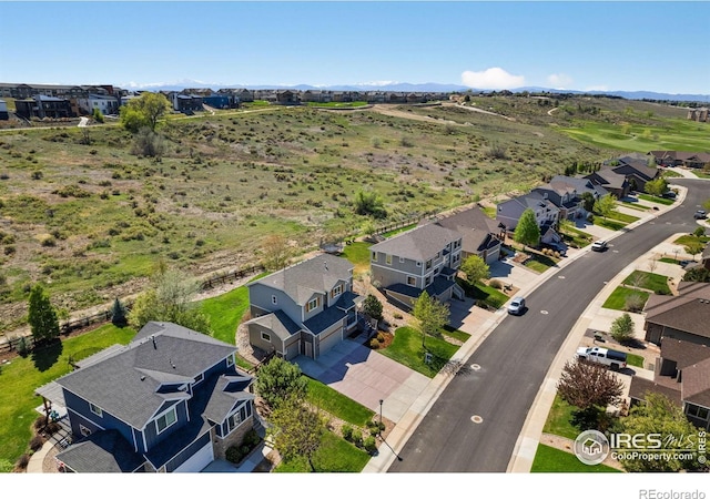 aerial view with a mountain view and a residential view