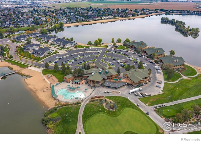 bird's eye view with a water view