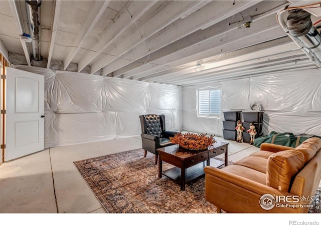 living room with concrete flooring