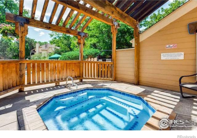 6036 Gunbarrel Ave Unit B, Boulder, CO 80301 - view of pool with fence, a pergola, and a community hot tub