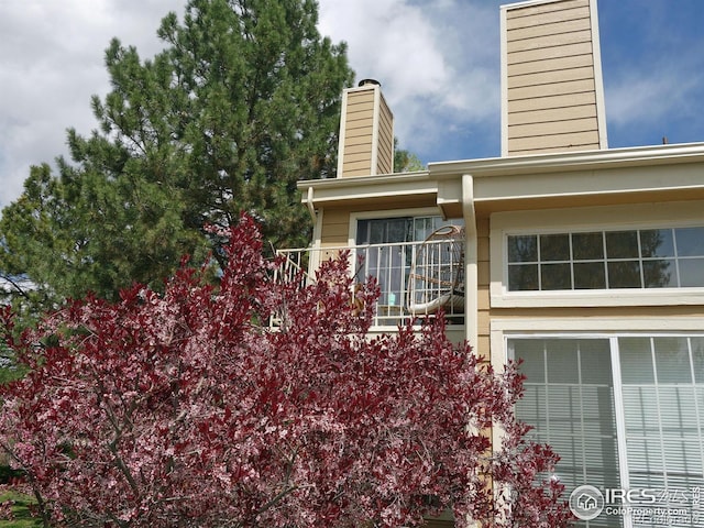 6036 Gunbarrel Ave Unit B, Boulder, CO 80301 - view of front facade with a chimney