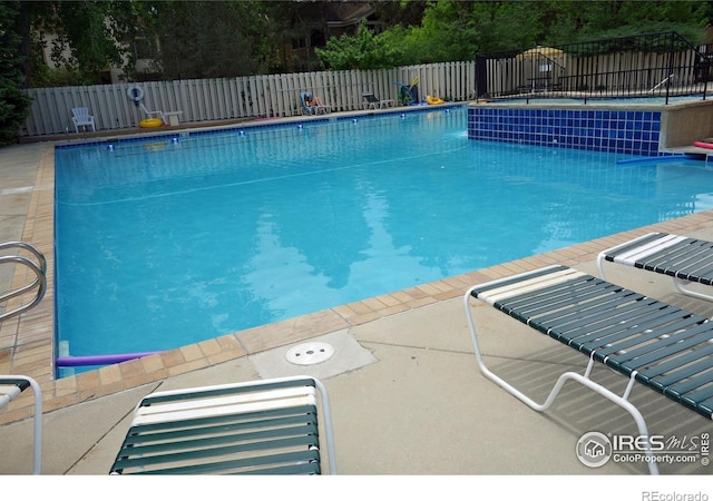 6036 Gunbarrel Ave Unit B, Boulder, CO 80301 - view of pool featuring fence and a fenced in pool