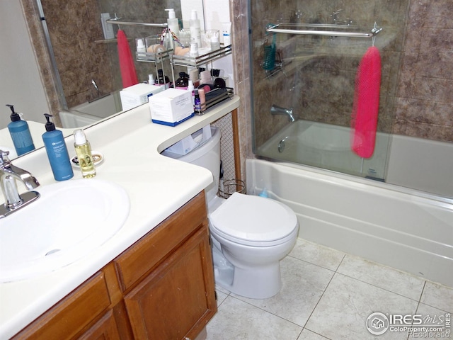 6036 Gunbarrel Ave Unit B, Boulder, CO 80301 - full bath with tile patterned flooring, enclosed tub / shower combo, toilet, and vanity