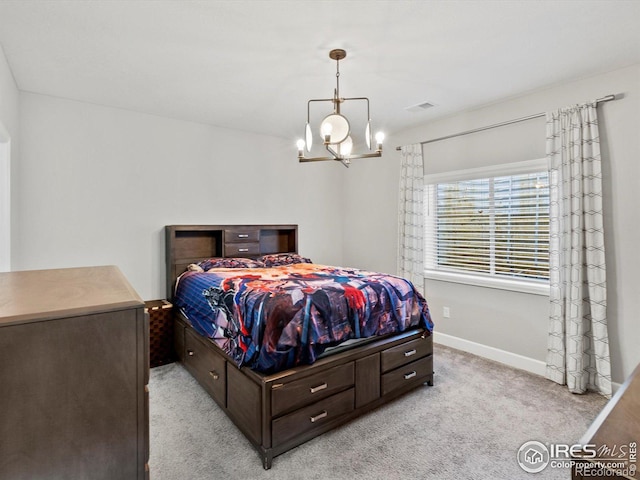 bedroom with an inviting chandelier, baseboards, light carpet, and visible vents