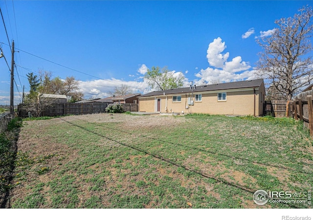 view of yard featuring a fenced backyard