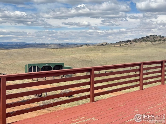 115 Arapaho Ridge Rd, Livermore, CO 80536 - wooden terrace featuring a rural view