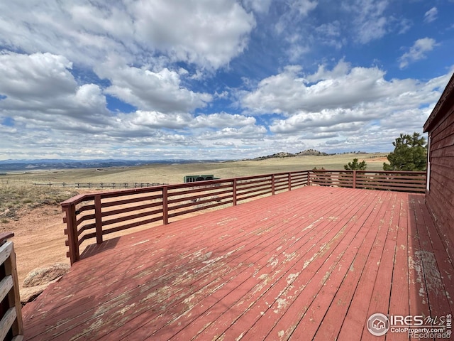 115 Arapaho Ridge Rd, Livermore, CO 80536 - wooden deck featuring a rural view
