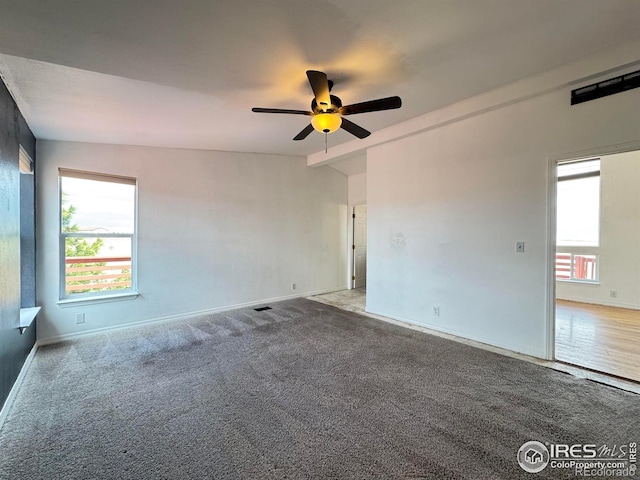 115 Arapaho Ridge Rd, Livermore, CO 80536 - carpeted spare room with baseboards and a ceiling fan